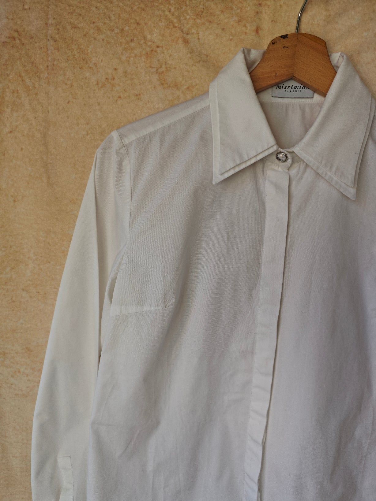 Camicia collo a punta larga