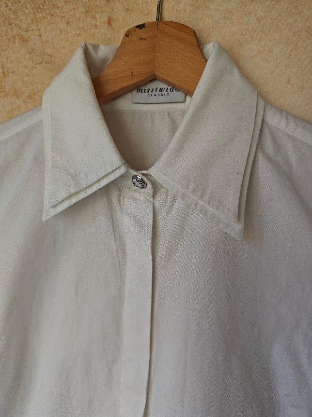Camicia collo a punta larga