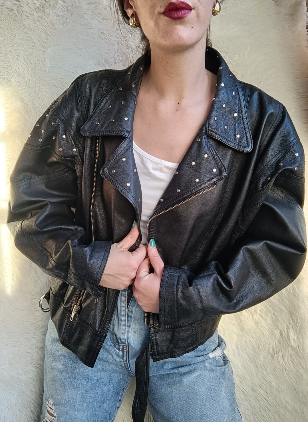 Giacca in pelle vintage con borchie