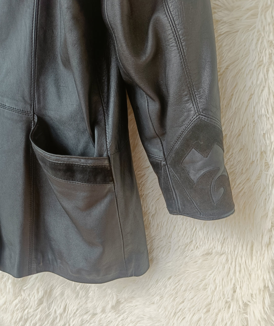 Giacca in pelle con inserti camoscio