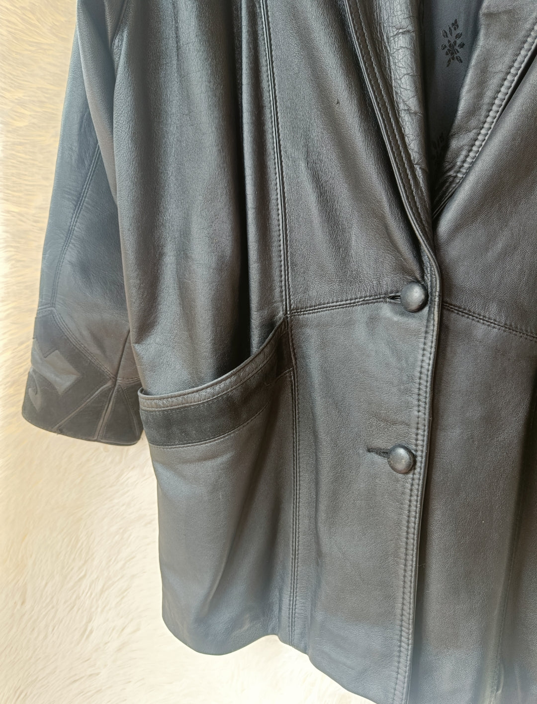 Giacca in pelle con inserti camoscio