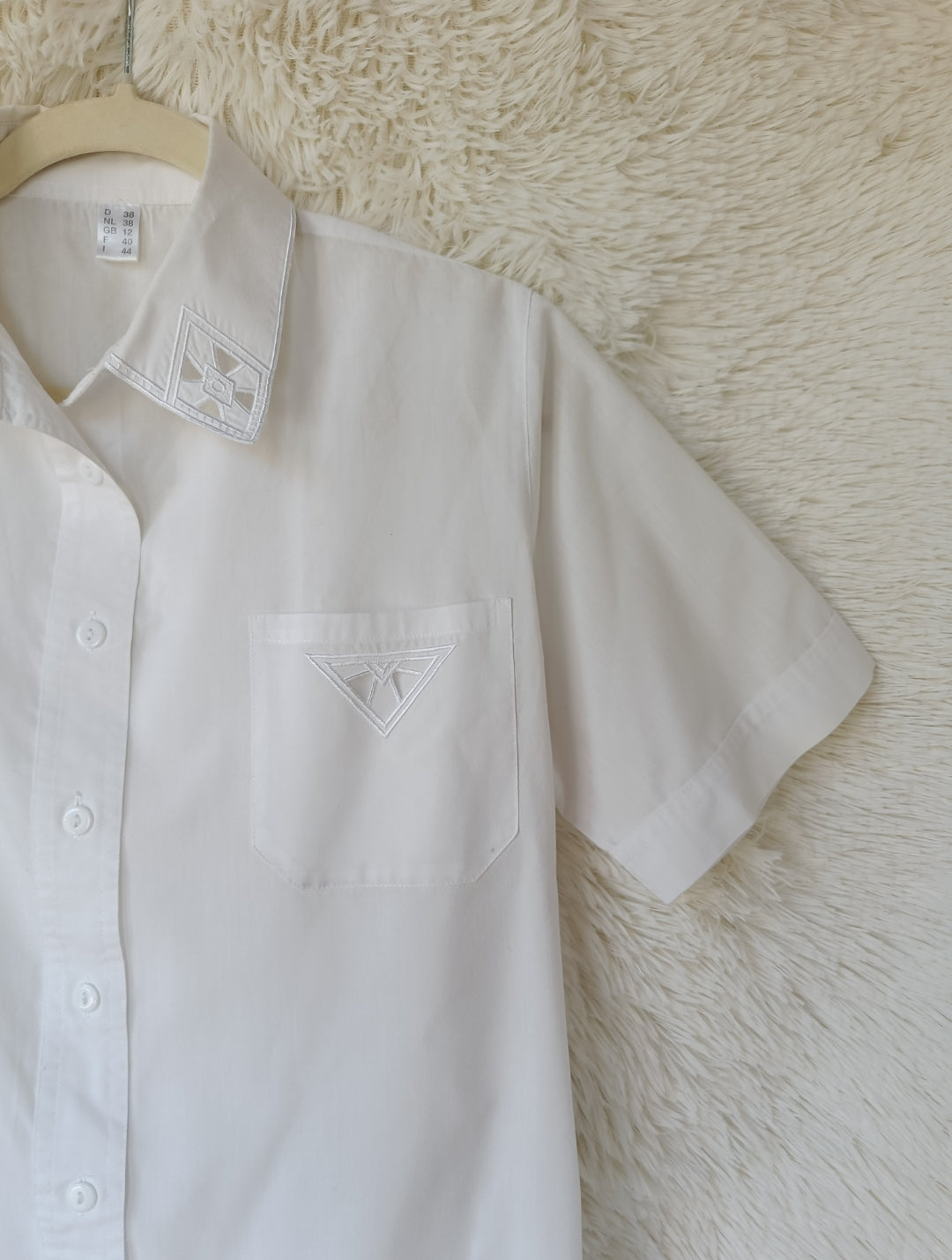 Camicia ricami geometrici
