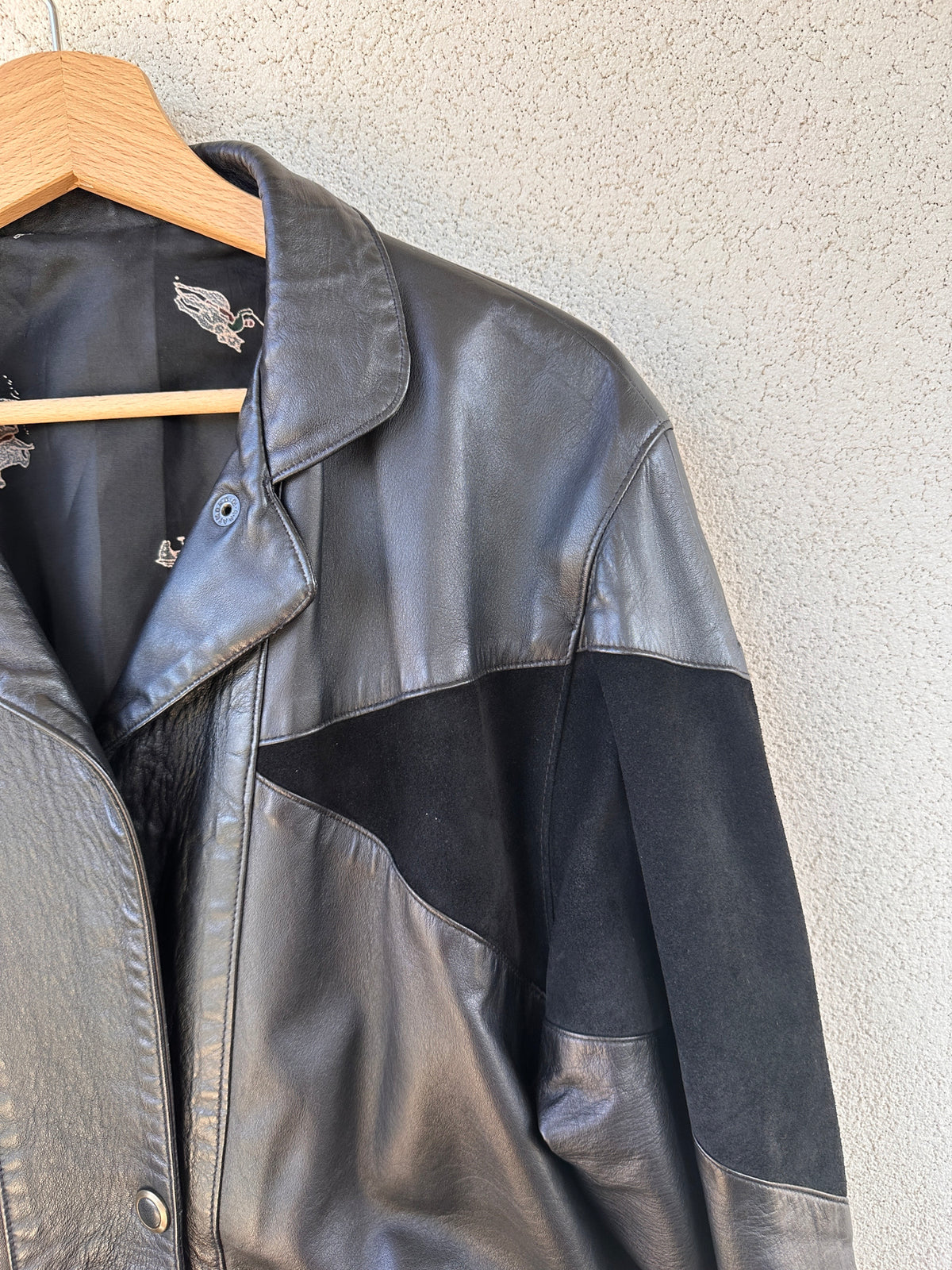 Bomber pelle fantasia geometrica