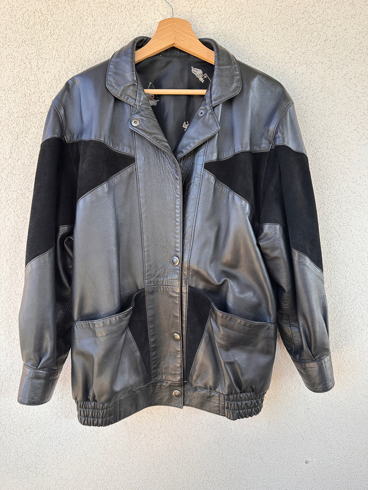 Bomber pelle fantasia geometrica