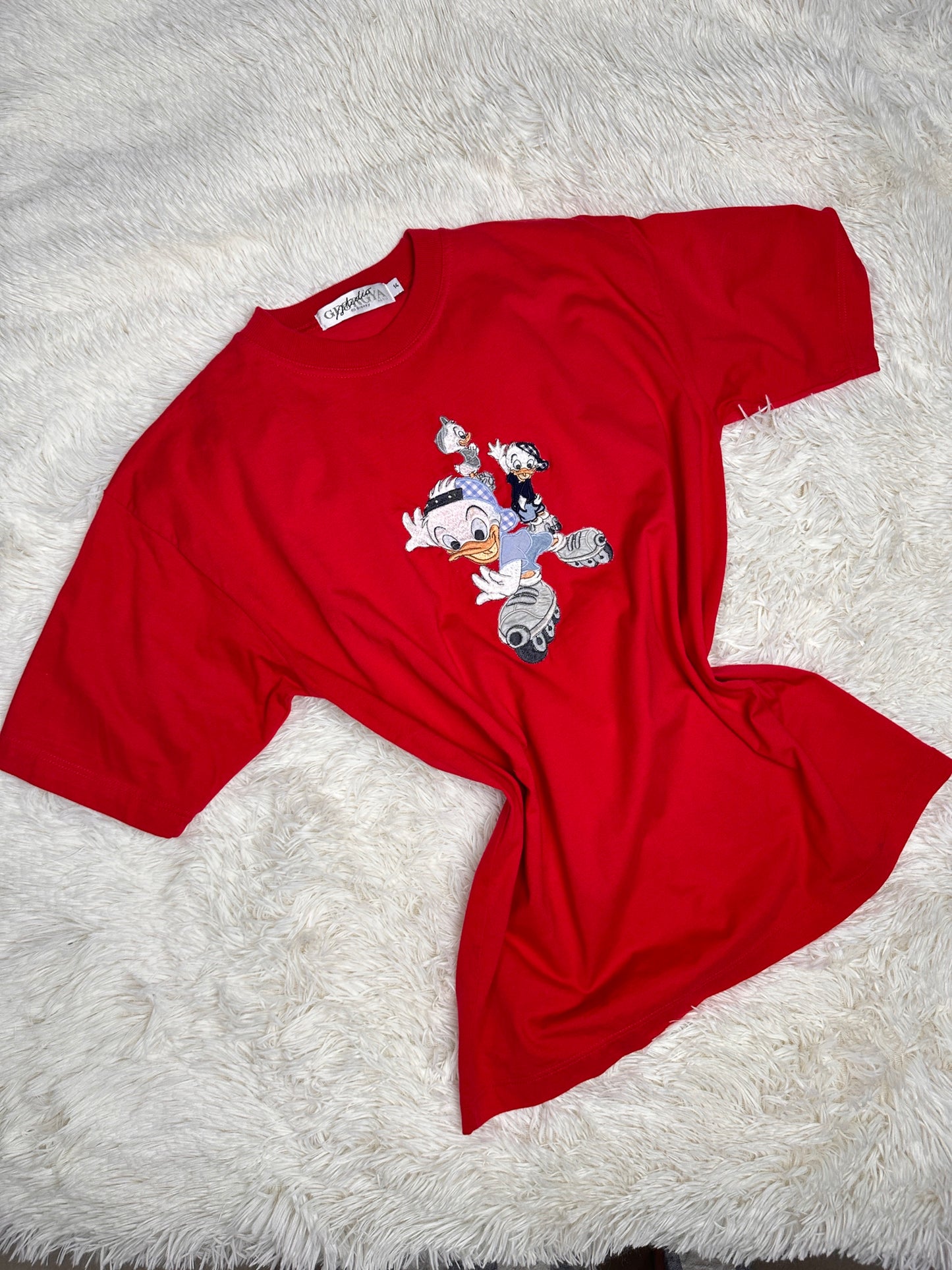 T-shirt Qui, Quo, Qua sui Pattini