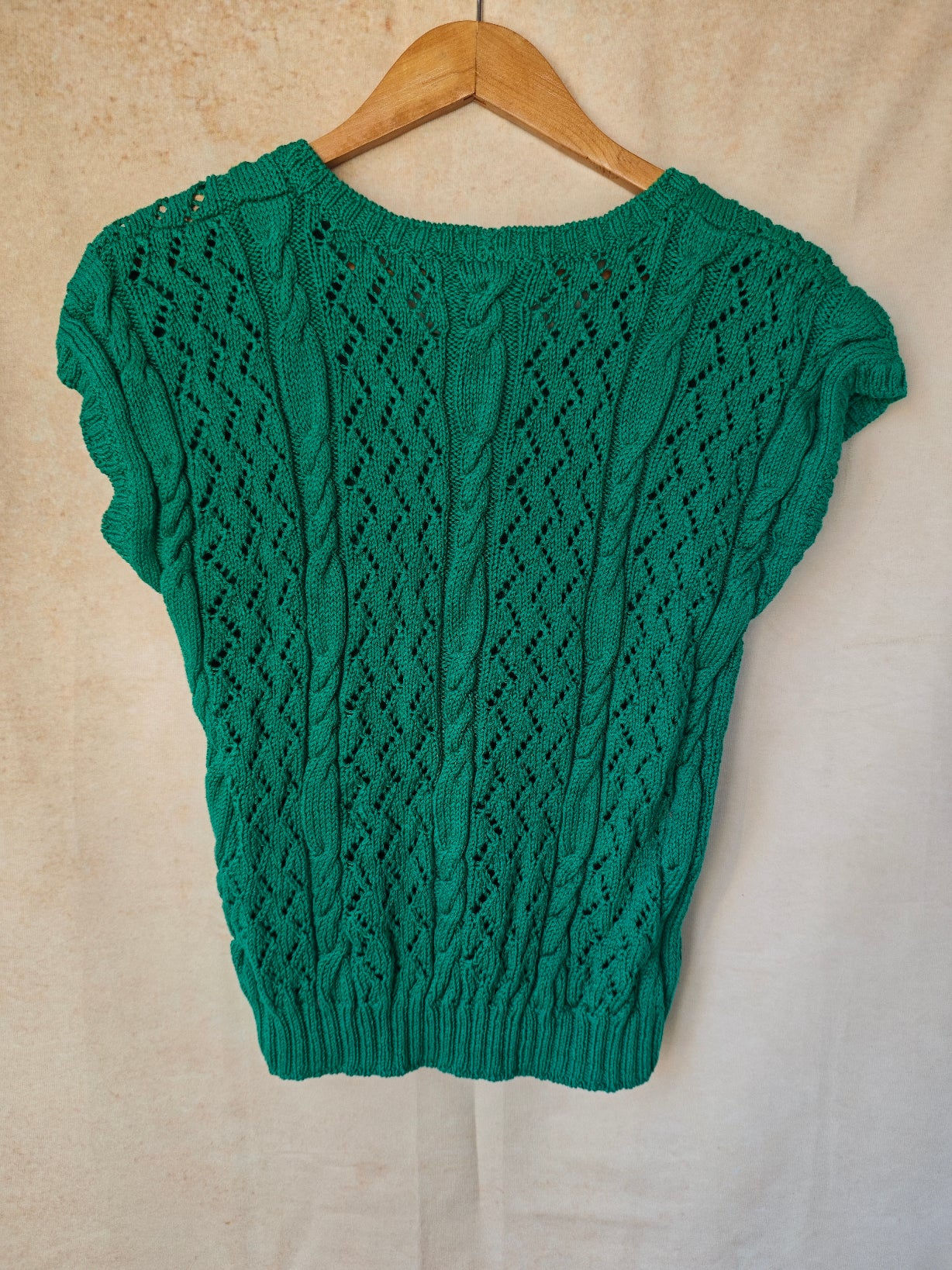 Maglioncino smanicato verde