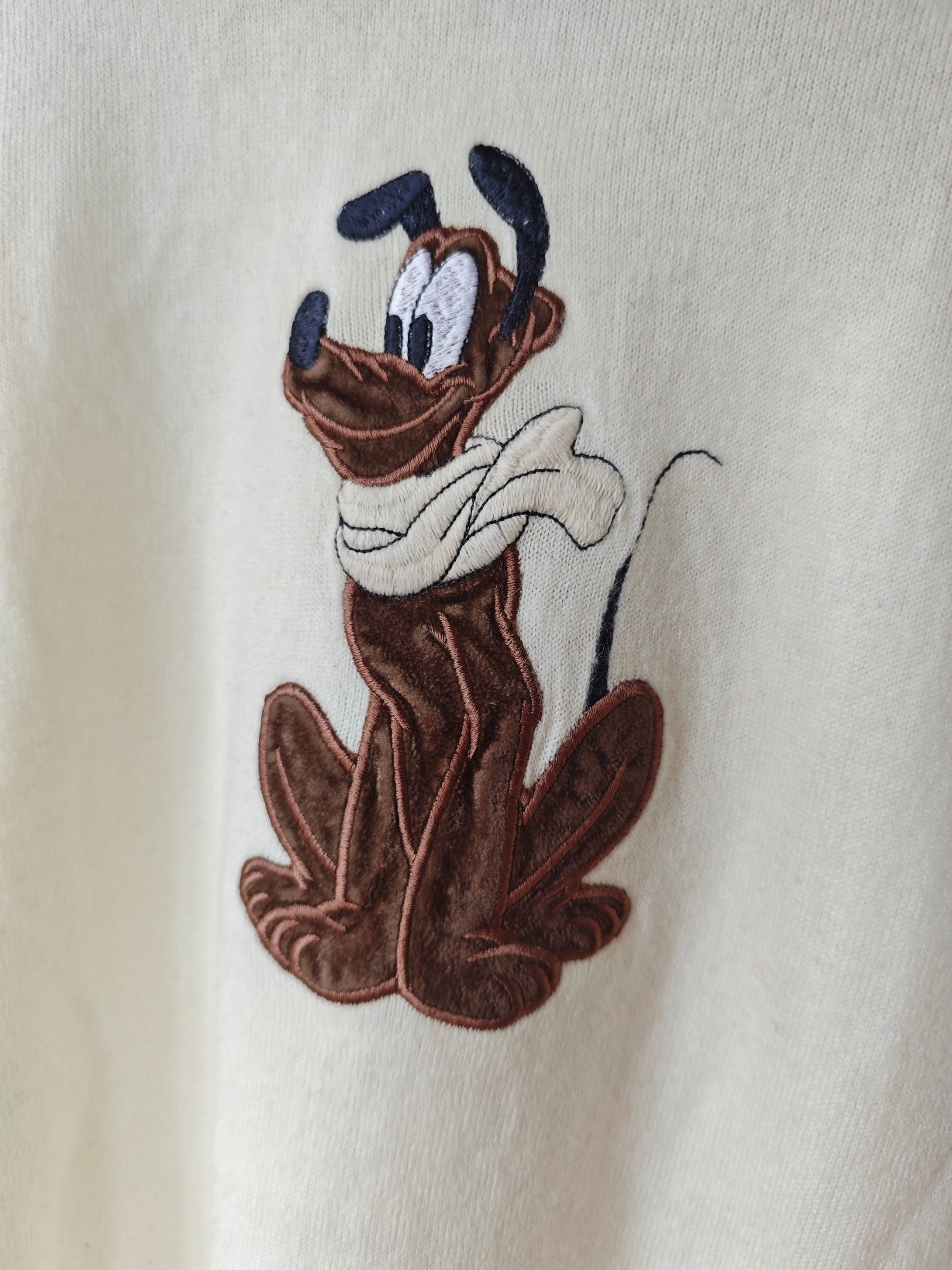 Pull Pluto crema