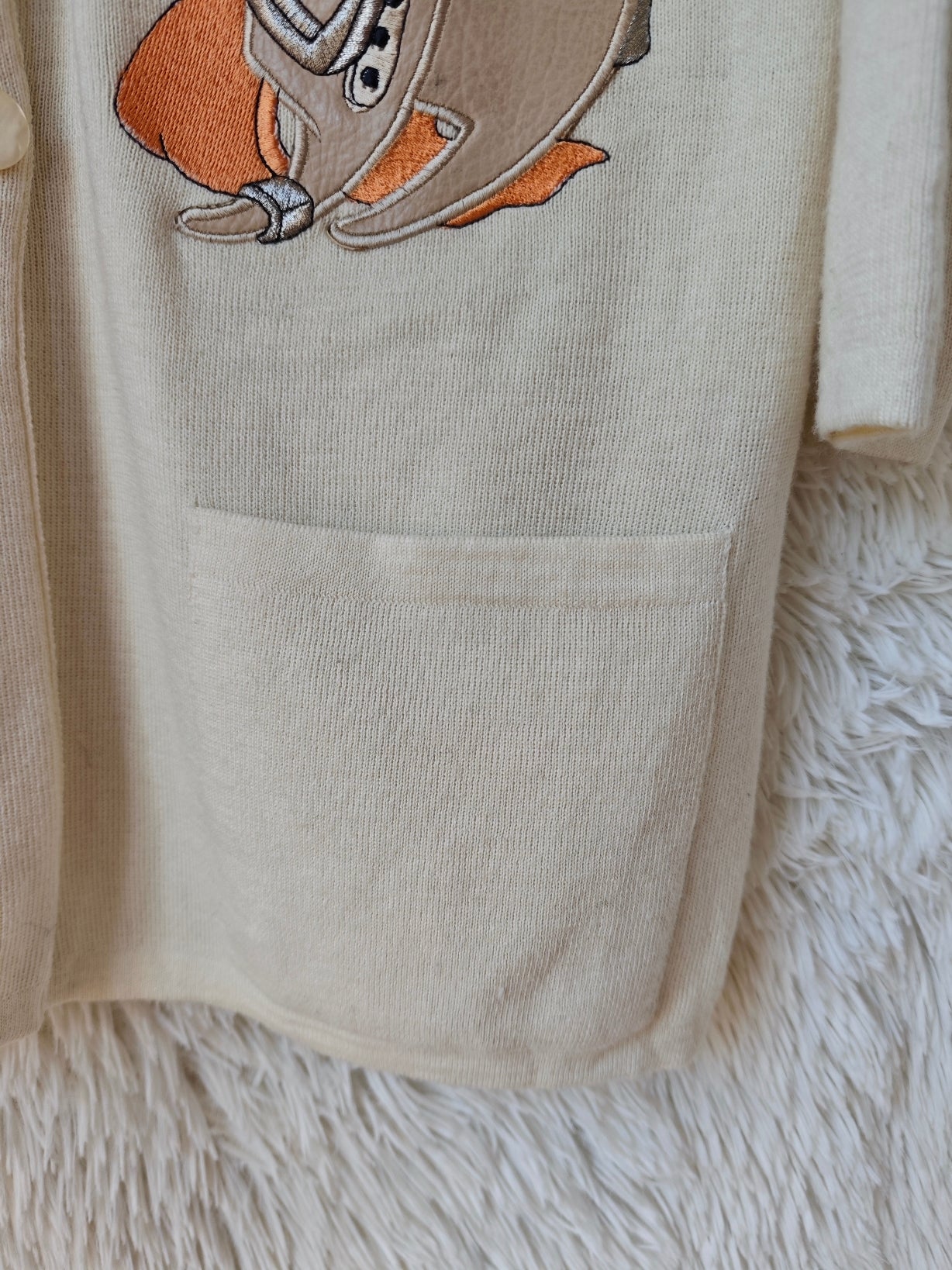 Cardigan paperino crema