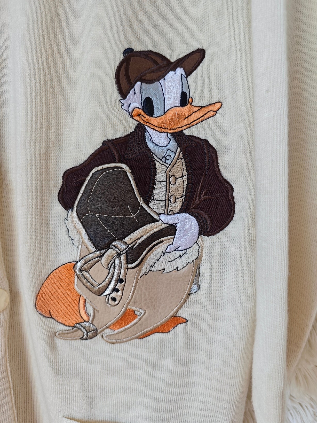 Cardigan paperino crema