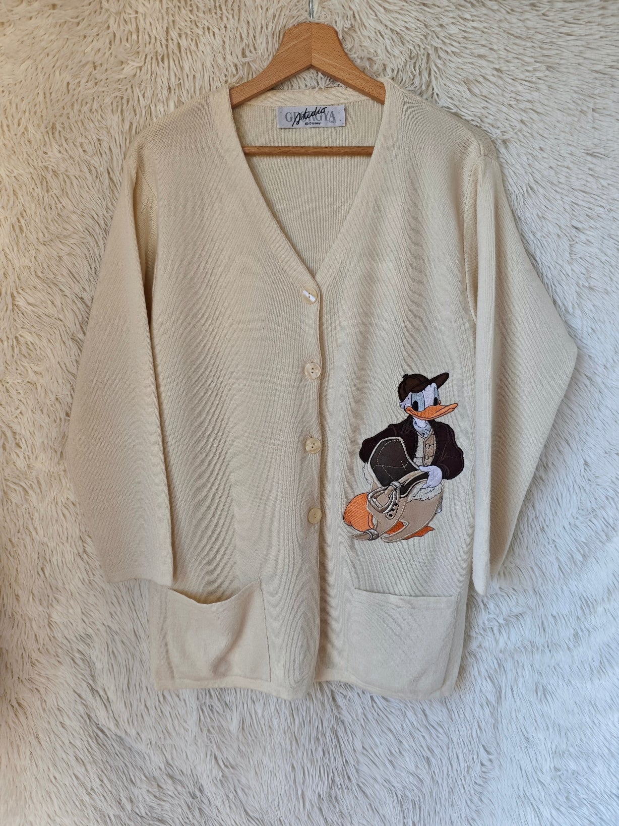 Cardigan paperino crema