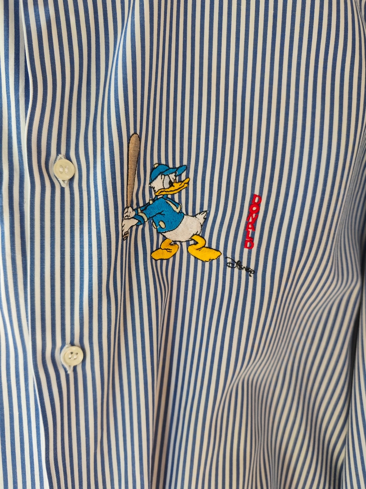 Camicia a righe paperino sportivo