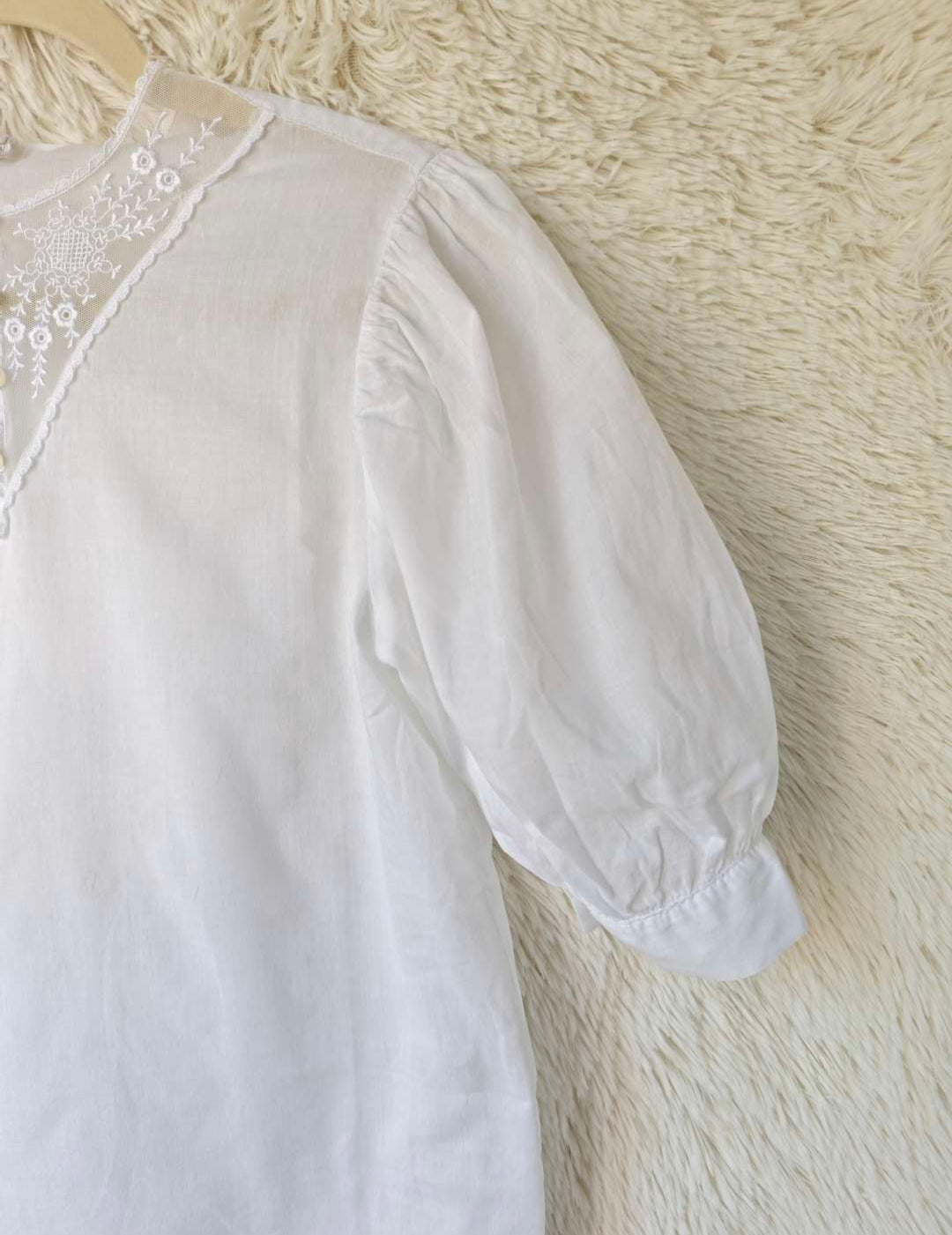 Blusa ricamata tulle