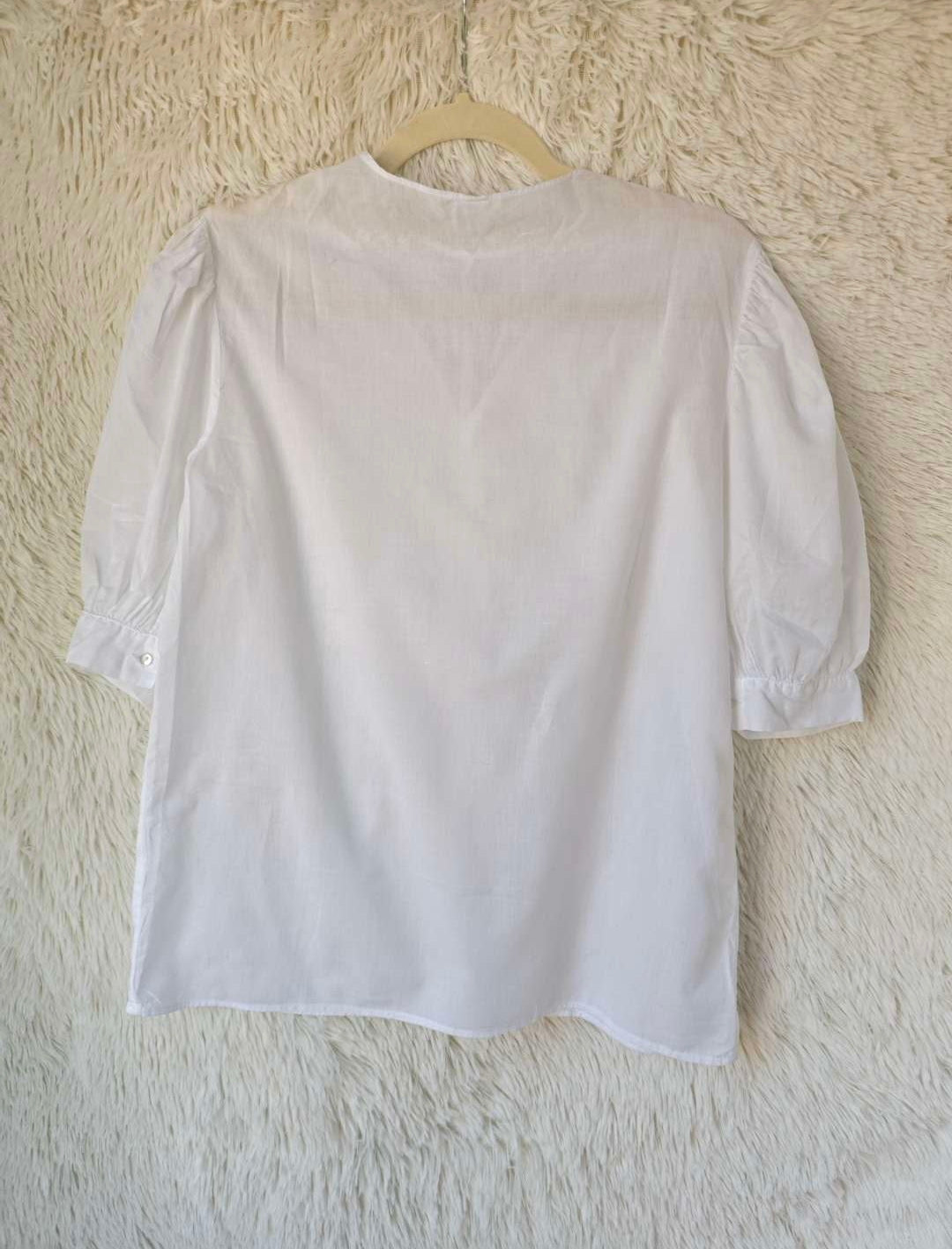 Blusa ricamata tulle