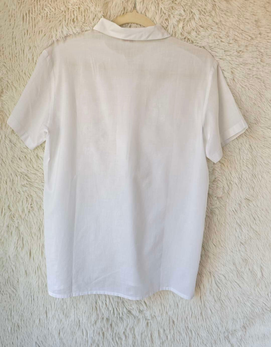 Camicia ricamata a mano